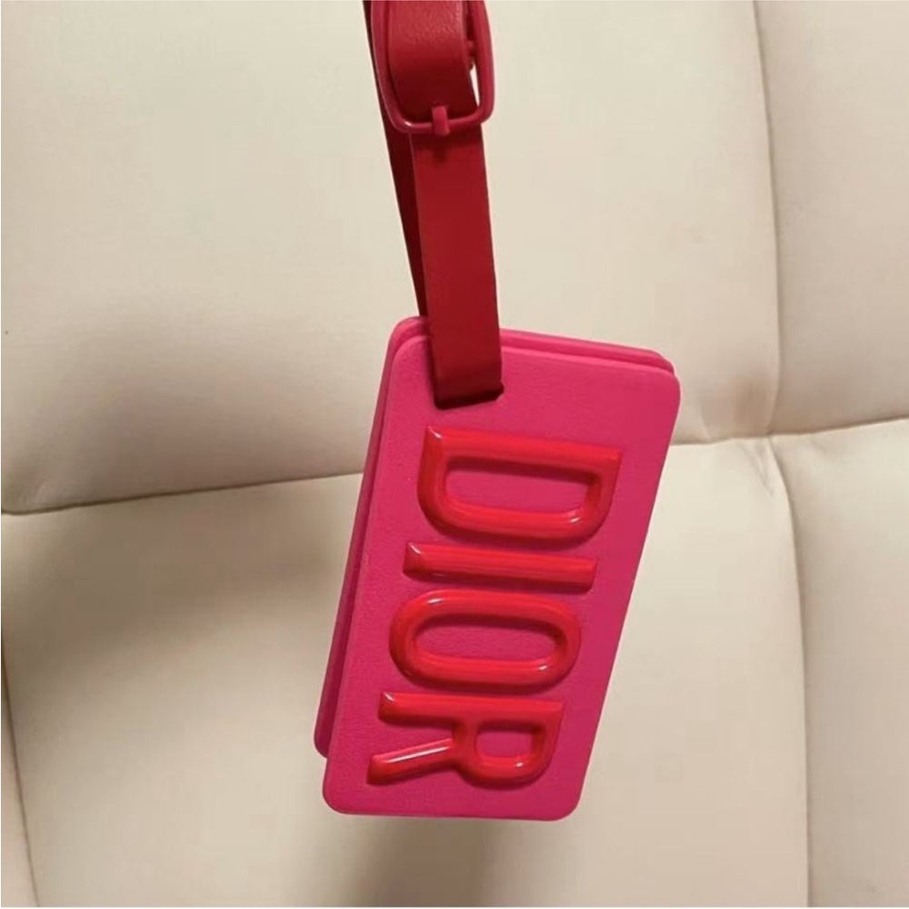 Dior red mirror luggage tag